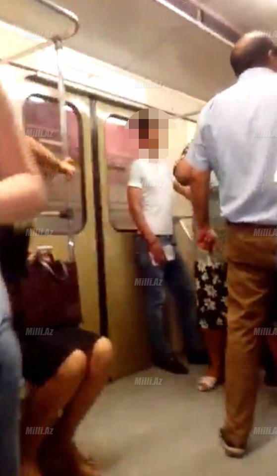 Bakı metrosunda DAVA:  Oğlan söyüş söyən qadını döydü (FOTO)